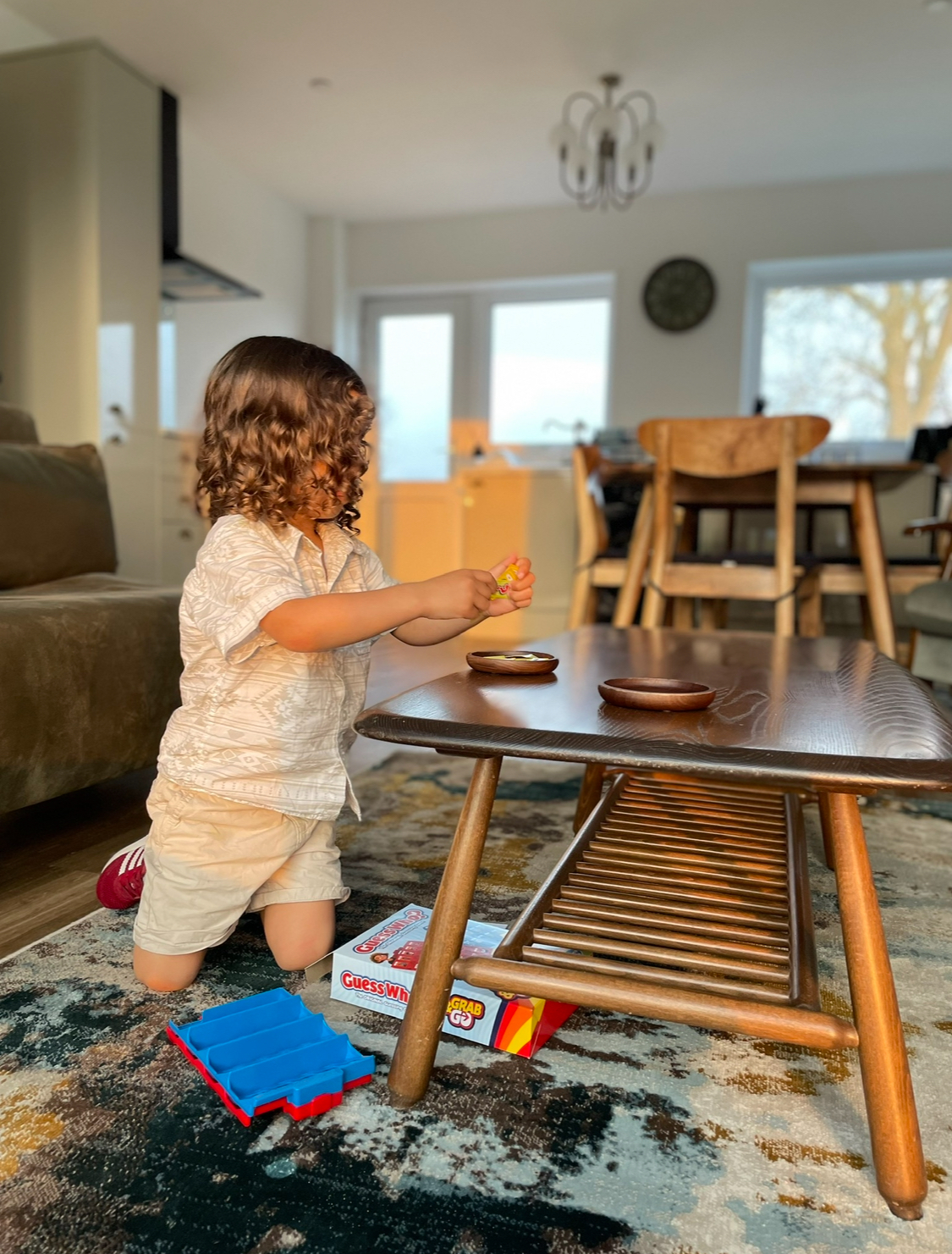 Games by the coffee table at Ty Ray Penmaes