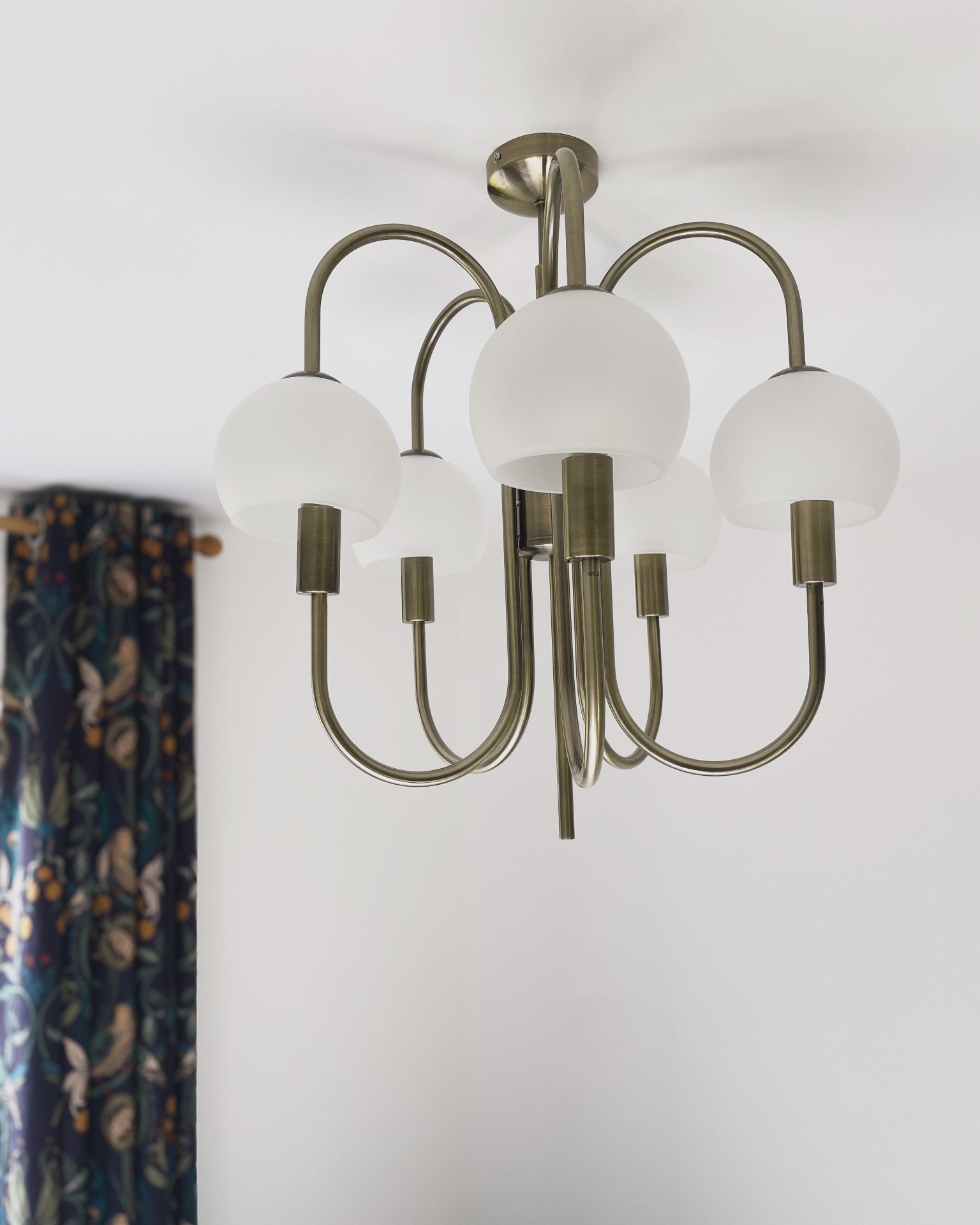 The brass light fitting at Ty Ray Penmaes